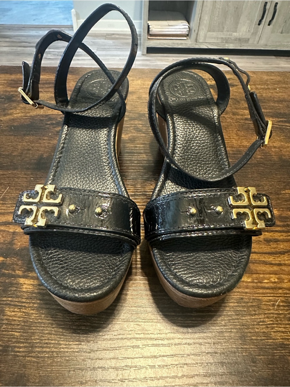 Tory Burch Black Patent Leather Wedge Sandals with Gold Logo Accent